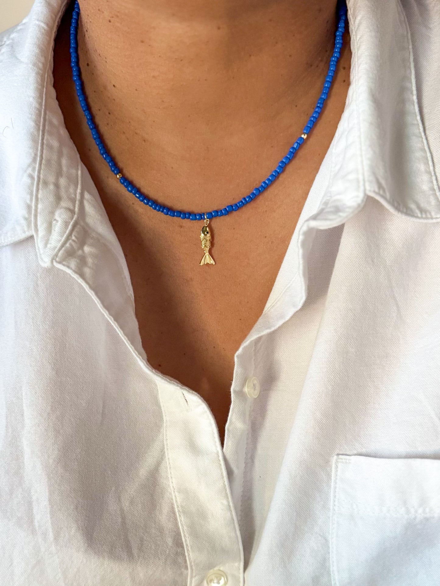 Gold fish necklace