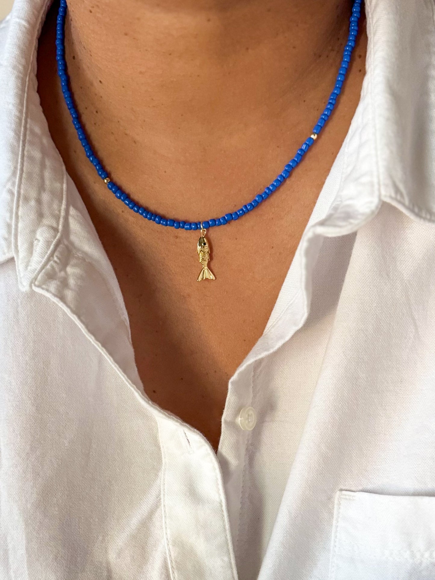 Gold fish necklace