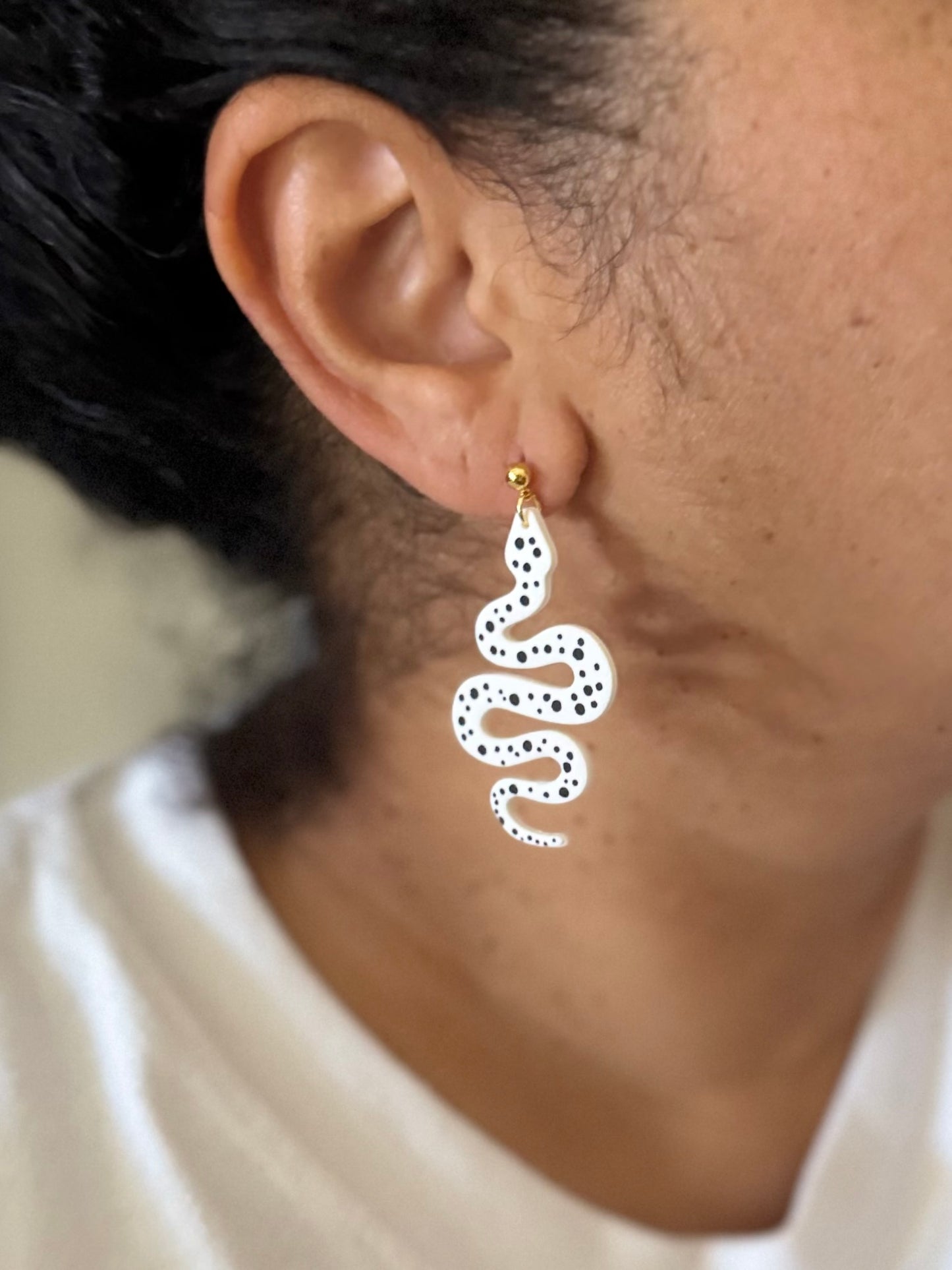 Polka dot snake earrings