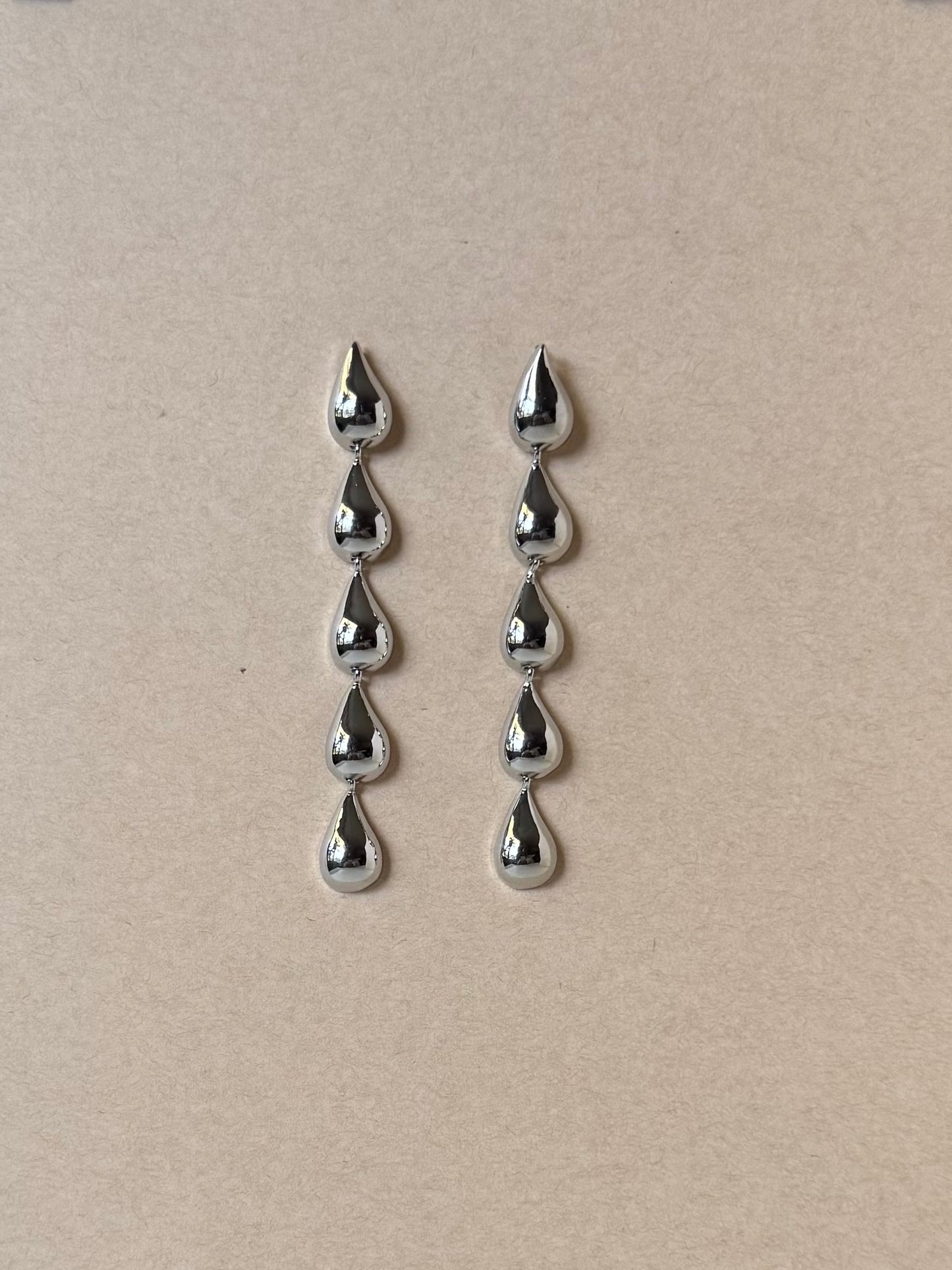 Silver teardrops