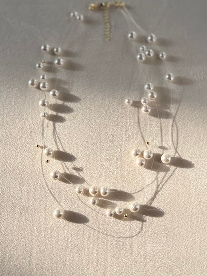 Floating pearl Illusion necklace