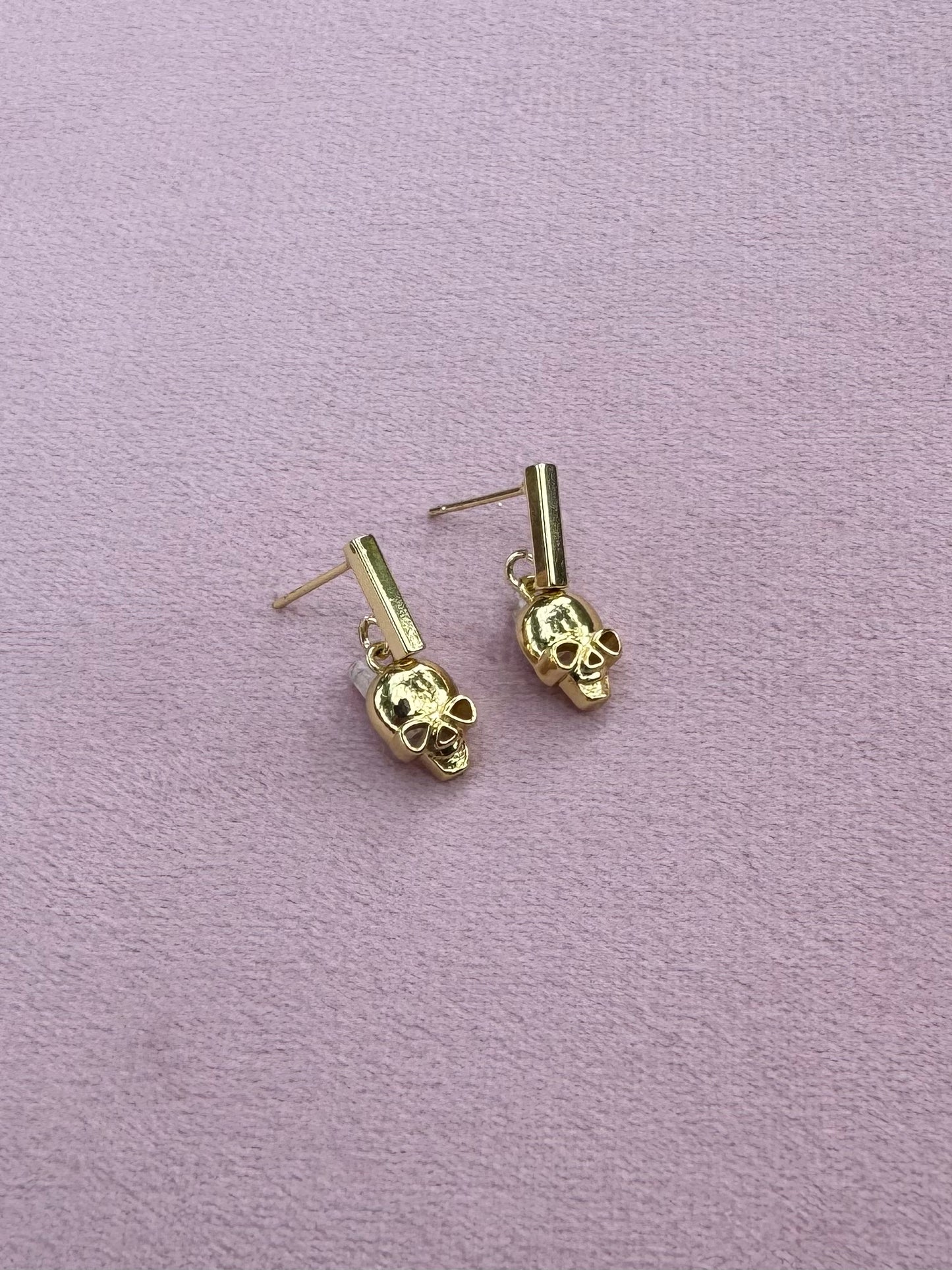 Tiny skull earrings