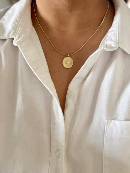 Radiant charm necklace