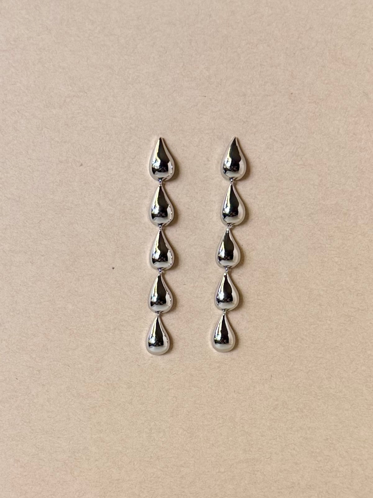 Silver teardrops