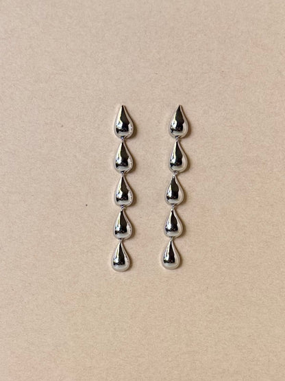 Silver teardrops