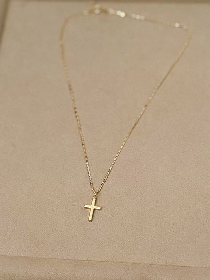 Mini gold cross necklace