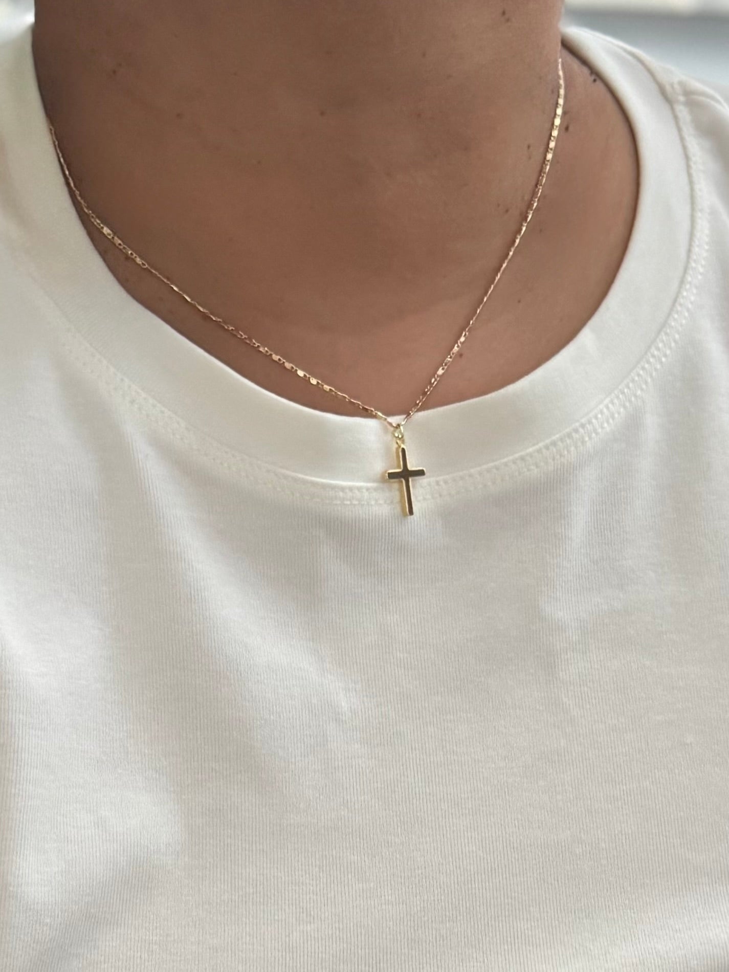 Mini gold cross necklace