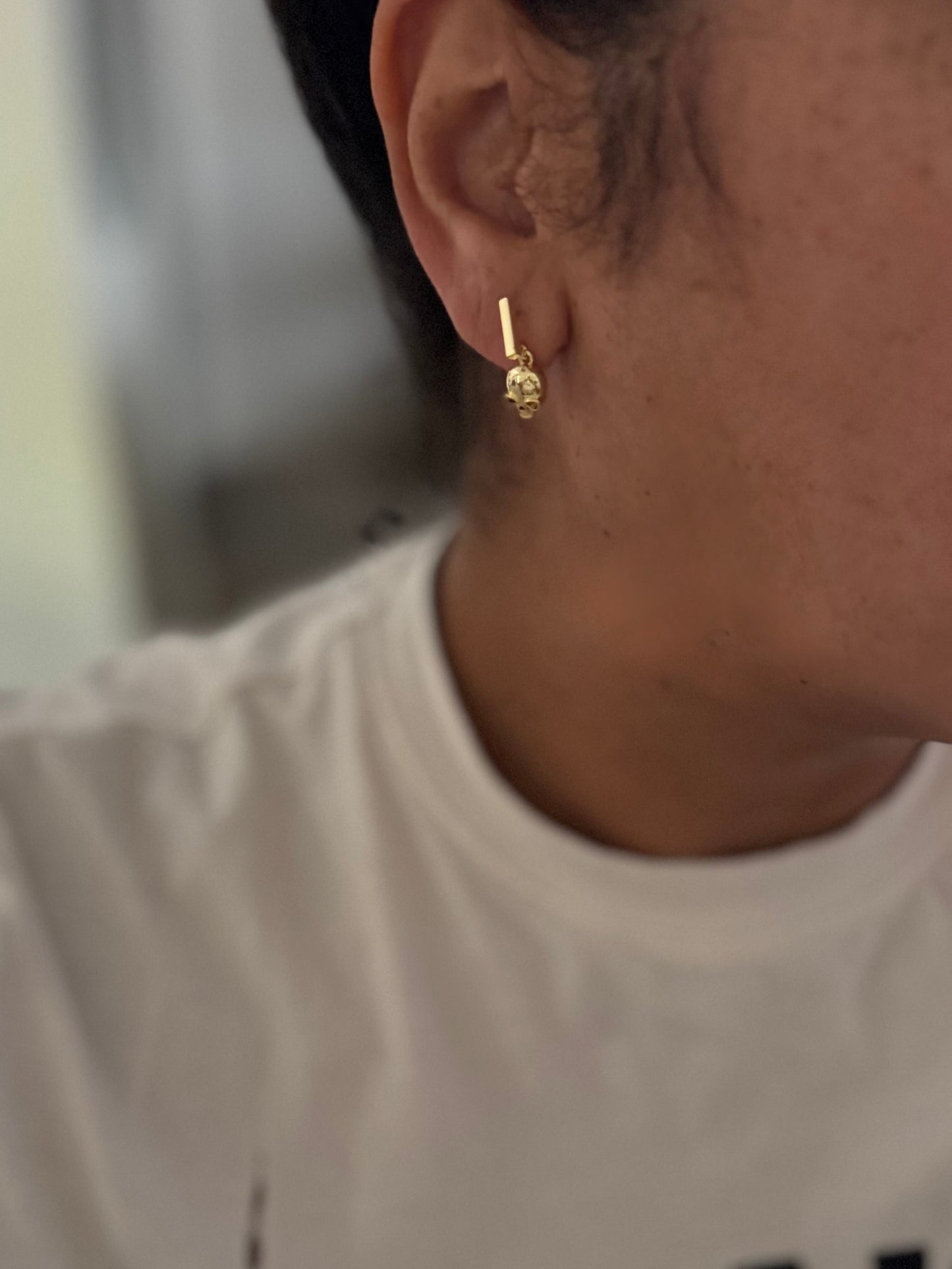 Tiny skull earrings