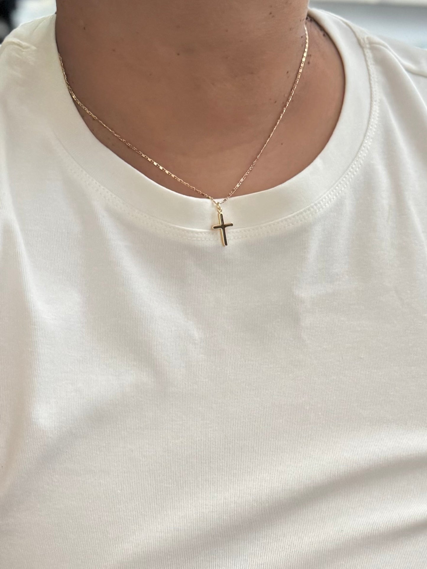 Mini gold cross necklace