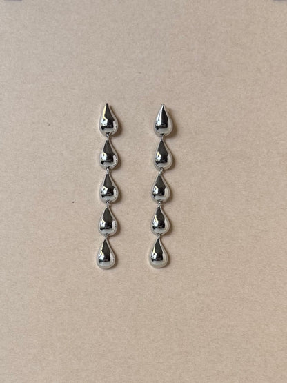 Silver teardrops