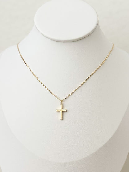 Mini gold cross necklace